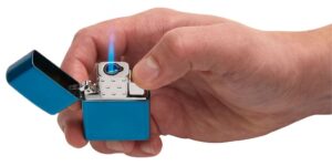 Single Torch Butane Lighter Insert in blue case in hand and lit