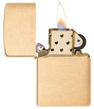 Classic Brushed Solid Brass Windproof Lighter with its lid open and lit