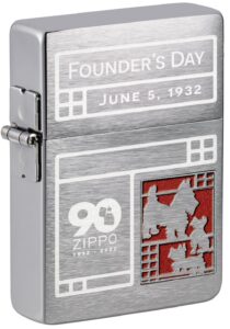 Front shot of The 2022 Founder's Day Collectible Windproof Lighter standing at a 3/4 angle